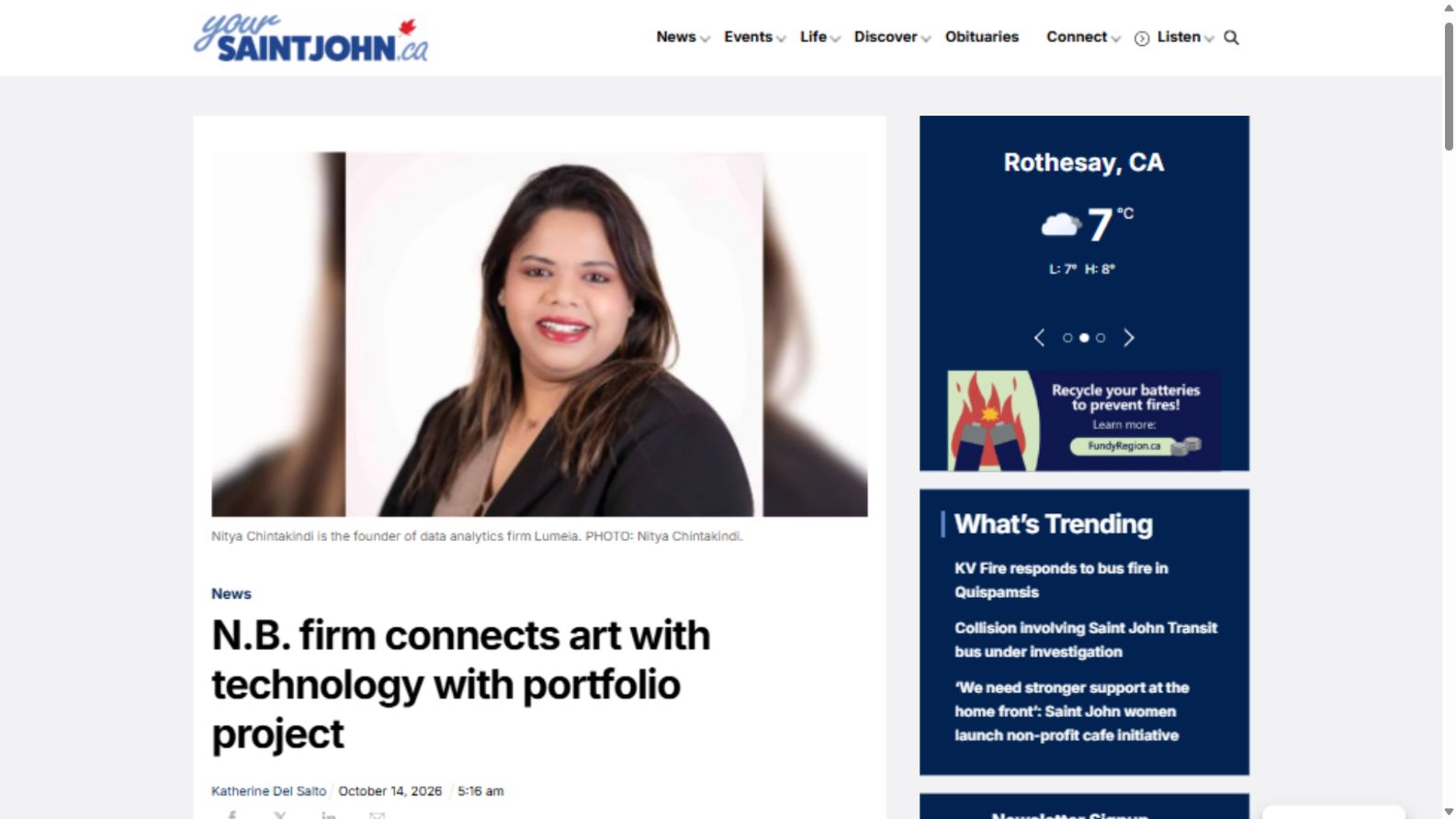 Your Saint John article page showing its masthead, lead photograph, and headline about Lumeia's portfolio project